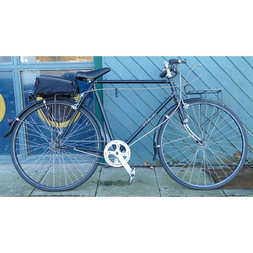 71 - A gentlemen's black road bicycle, each tyre 66cm diameter.