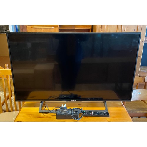 81 - A Sony Bravia 43 inch TV, model KD-XE 8396, date of manufacture 2018, with AC lead and remote.