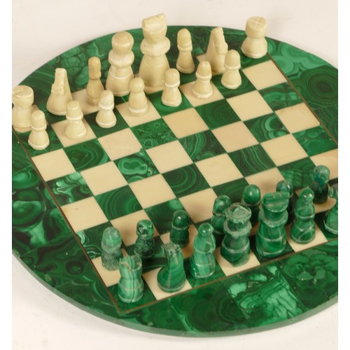 103 - A miniature chess set, having malachite chess pieces & board.