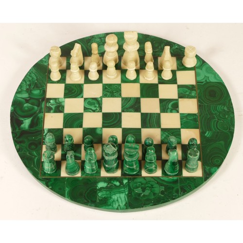 103 - A miniature chess set, having malachite chess pieces & board.