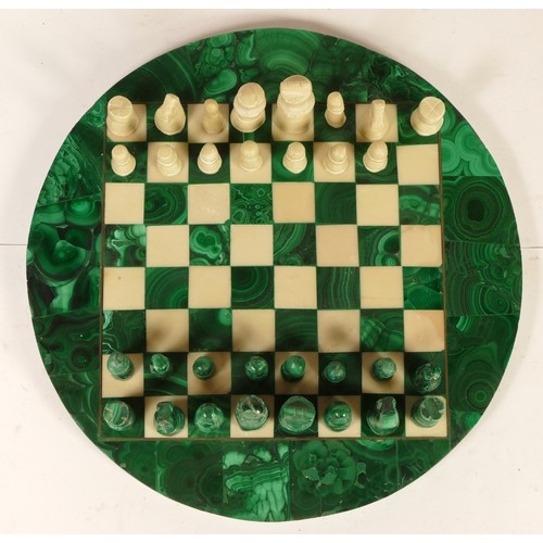 103 - A miniature chess set, having malachite chess pieces & board.