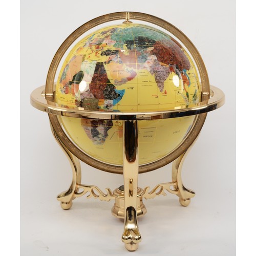 104 - A large terrestrial world globe on gimbal cast brass frame, set with semi precious stones and minera... 