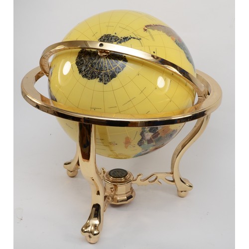 104 - A large terrestrial world globe on gimbal cast brass frame, set with semi precious stones and minera... 