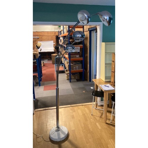 113 - A modern floor standing lamp, having five branches with adjustable fittings, chrome plated on a marb... 