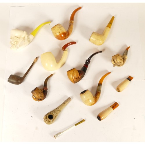 119 - A collection of early 20th century and later cased Meerschaum pipes and cheroot holders.