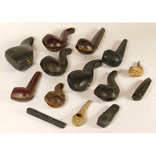 119 - A collection of early 20th century and later cased Meerschaum pipes and cheroot holders.