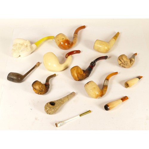 119 - A collection of early 20th century and later cased Meerschaum pipes and cheroot holders.