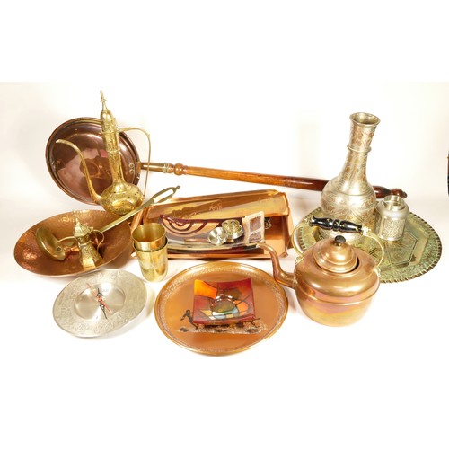 124 - A collection of assorted copper and brassware to include two 20th century Indian brass coffee pots a... 