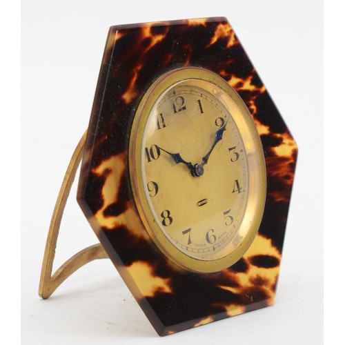 A 1930s Art Deco Swiss 8 day hexagonal tortoiseshell cased easel clock ...
