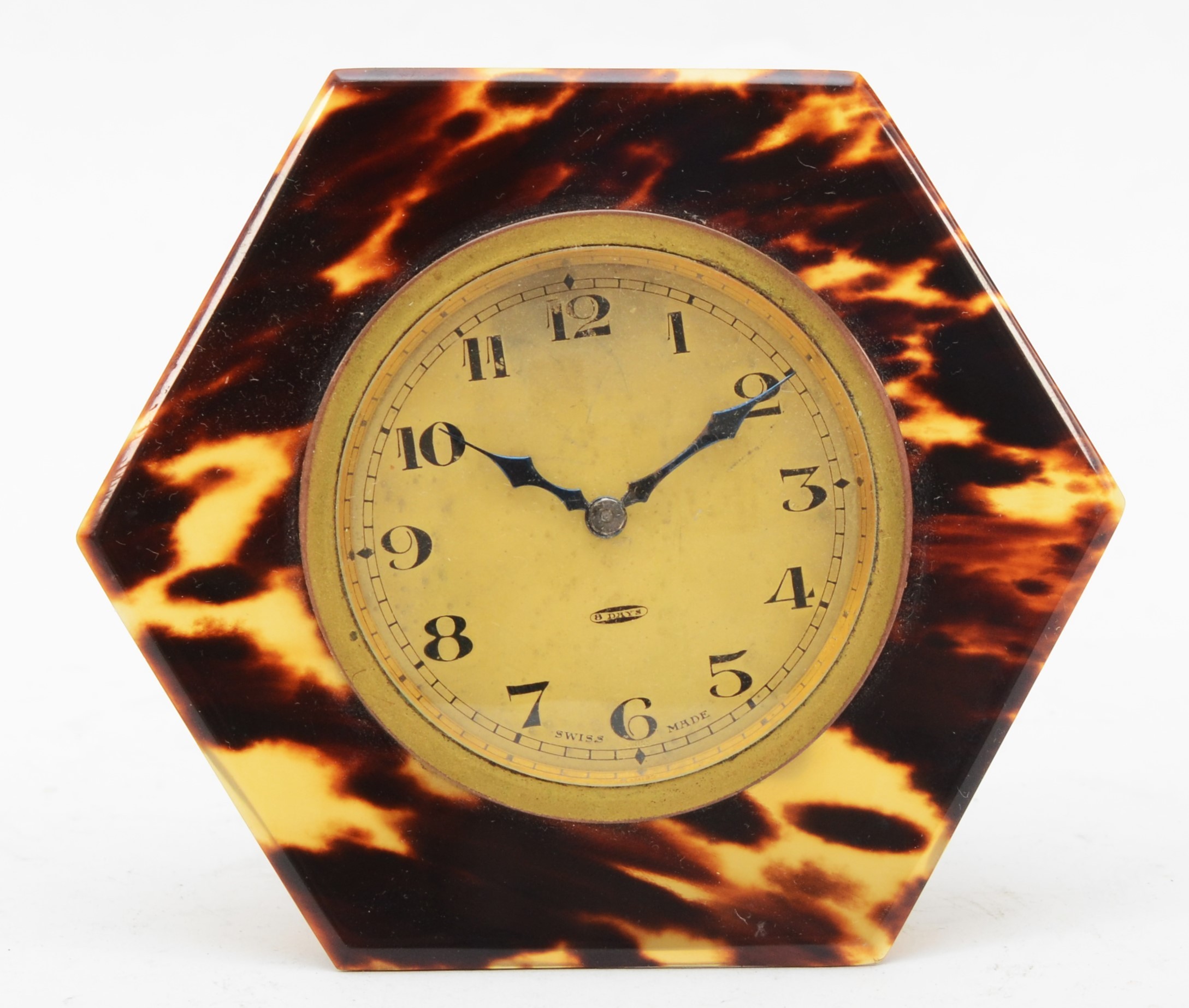 A 1930s Art Deco Swiss 8 day hexagonal tortoiseshell cased easel clock ...