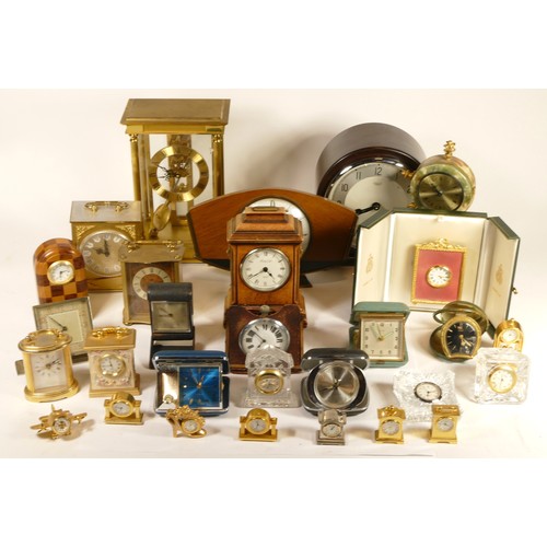 A collection of mid 20th century and later mantel clocks, having manual