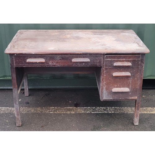 A large Victorian crackle glazed pine clerks desk, the sloped ...