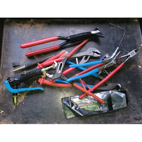 7 - A quantity of used tools to include crowbars, levels and clamps.