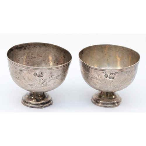 3 - Two Ottoman Empire silver cups with chased scrolling decoration, 4.5 x 5.5cm, 52gm.