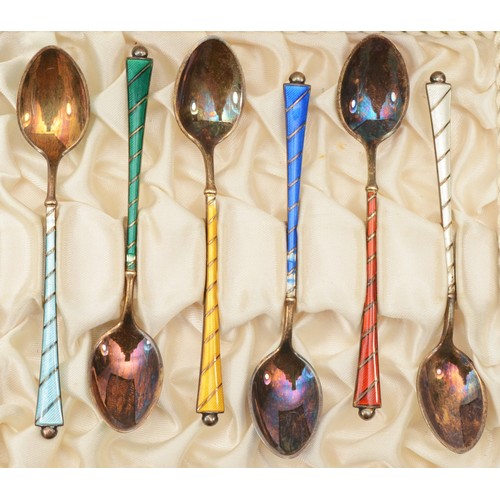 A set of six early 20th century Danish silver and enamel tea spoons, 52gm, boxed.