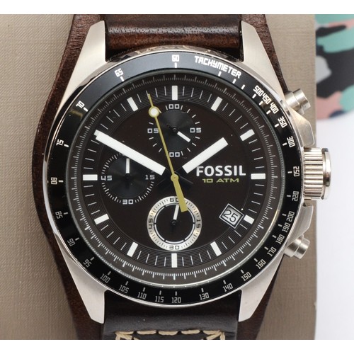 92 - Fossil, a stainless steel Decker gentleman's chronograph wristwatch, leather strap, CH2599, together... 