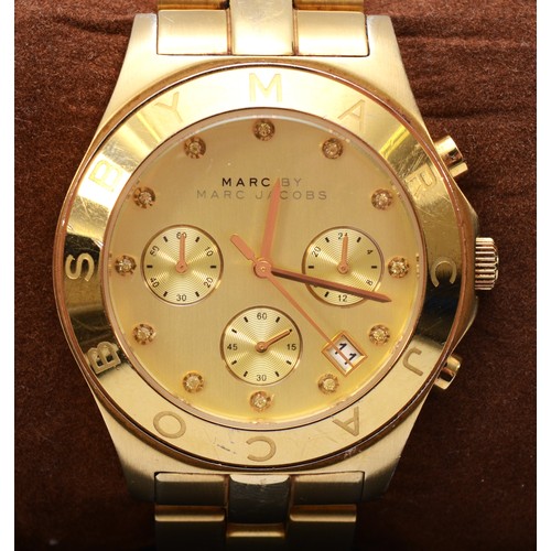 97 - Marc Jacobs, a stainless steel gold plated chronograph wristwatch, MBM3101, together with a Citizen ... 