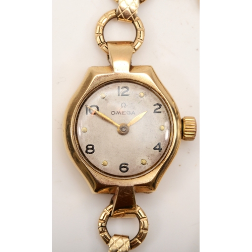 102 - Omega, a 9ct gold cased ladies key wind wrist watch, the silvered dial set with Arabic numerals, cas... 