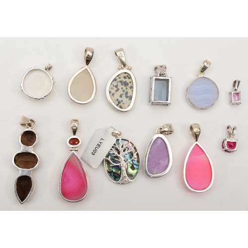 121 - Twelve silver pendants to include an abalone shell tree of life pendant, 38mm, dyed quartz and jaspe... 