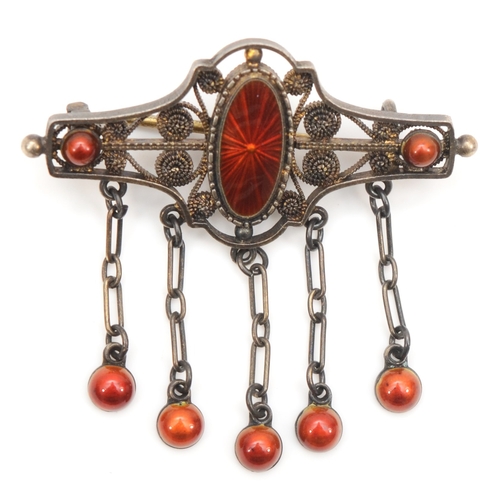 126 - A late 19th century Norwegian 930 silver filigree and red enamel brooch, by Marius Hammer, base meta... 