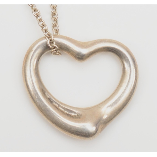 127 - A silver Tiffany & Co heart shaped pendant on silver chain, by Elsa Peretti, 19 x 22mm, 7gm.