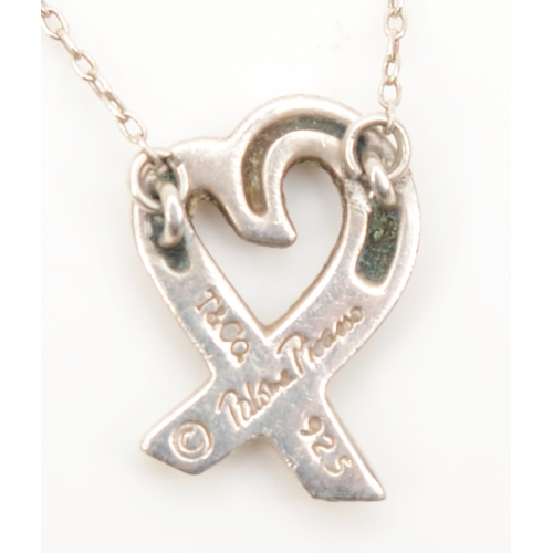 129 - A silver Tiffany & Co heart shaped pendant, on chain by Paloma Picasso, 14 x 10mm, 3gm.