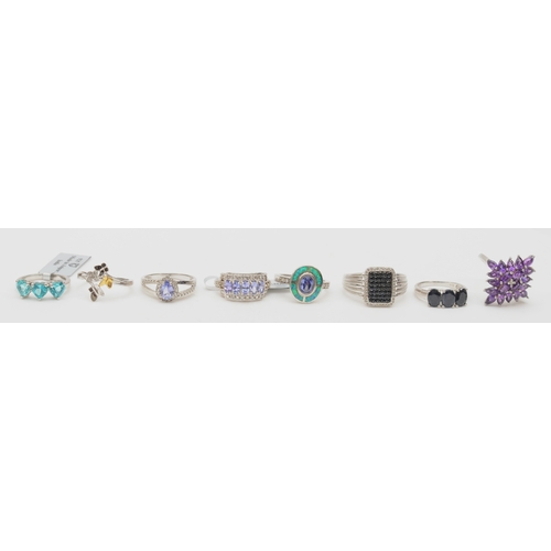 146 - Eight silver gem set rings to include an amethyst cluster ring, Q, 32gm.