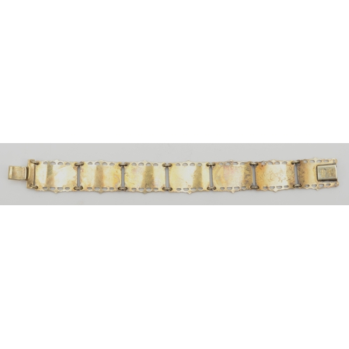 148 - A Norwegian silver gilt paneled bracelet with enameled winter scenes, by Kristian Hestenes, 18cm, 34... 