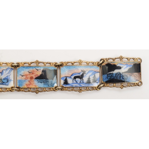 148 - A Norwegian silver gilt paneled bracelet with enameled winter scenes, by Kristian Hestenes, 18cm, 34... 