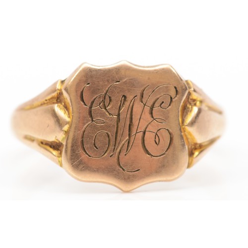 157 - A 9ct gold Gentleman's ring, with monogrammed shield cartouche, Birmingham 1918, Y, 5.8gm.