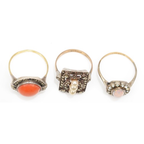 162 - A 9ct gold and silver set coral dress ring, N, together with two 9ct gold and silver dress rings, 10... 