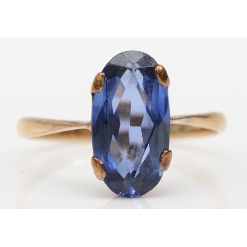 168 - A 9ct gold synthetic sapphire dress ring, P, 2.2gm.