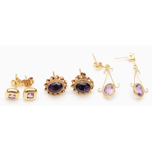 180 - A pair of 9ct gold amethyst stud earrings with rope twist decoration, 10mm, together with a pair of ... 