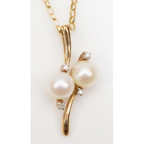 193 - A 9ct gold cultured pearl and eight cut diamond pendant, on 375 chain, 22mm, 2.1gm.