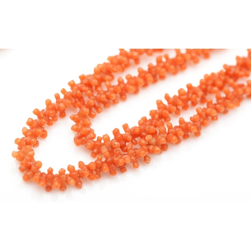 200 - A 9ct gold clasped coral bead necklace, 54cm, together with another 9ct gold clasped coral necklace.