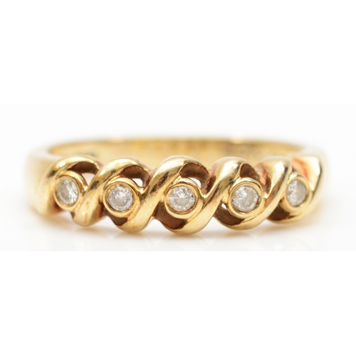 210 - A 9ct gold five stone brilliant cut diamond dress ring, stated weight .10, N, 2.5gm.