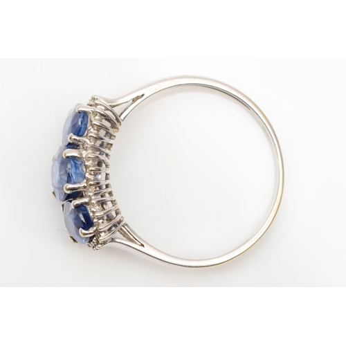 211 - A 9ct white gold three stone kyanite and eight cut diamond dress ring, T-U, 3.4gm.