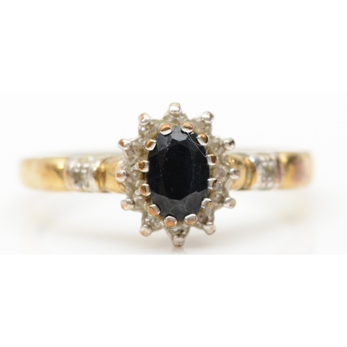 213 - A 9ct gold sapphire and eight cut diamond cluster ring, N, 2.2gm.