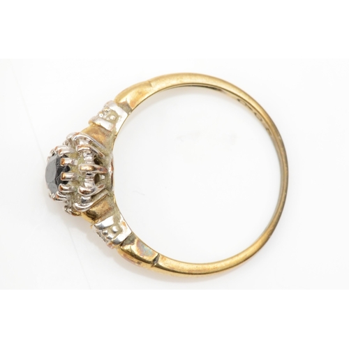 213 - A 9ct gold sapphire and eight cut diamond cluster ring, N, 2.2gm.