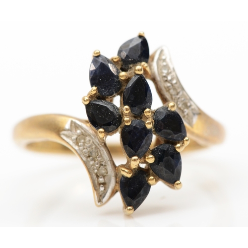 214 - A 9ct gold sapphire and eight cut diamond dress ring, P-Q, 2.9gm.