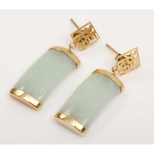 222 - A pair of unmarked gold mounted jadeite drop earrings, marked 9k to butterfly backs, 29 x 9mm, 3.5gm... 