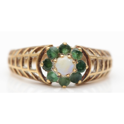 232 - A 9ct gold opal and emerald floral cluster ring, with pierced shoulders, S, 2.7gm.