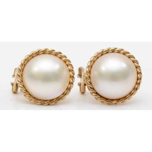 246 - A 9ct gold gold cultured pearl clip and post earrings, with rope twist boarder, 16mm, 8.4gm.