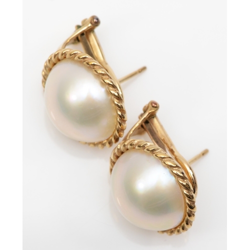 246 - A 9ct gold gold cultured pearl clip and post earrings, with rope twist boarder, 16mm, 8.4gm.