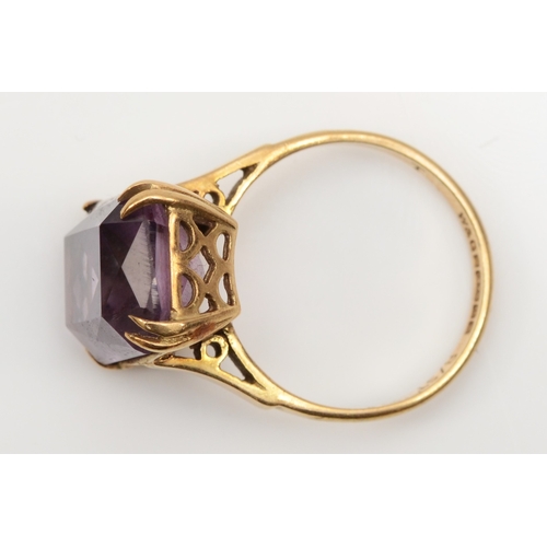 261 - A 9ct gold scissor cut amethyst cocktail dress ring, 10 x 13mm, L, 3.7gm.