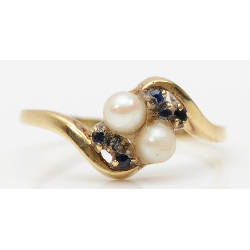 262 - A 9ct gold cultured pearl and sapphire dress ring, P, 1.8gm.