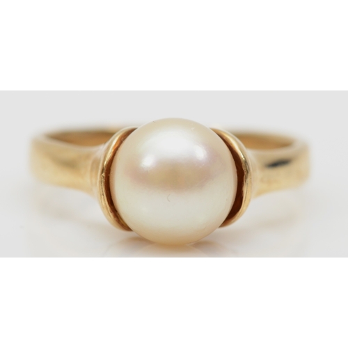 266 - A 9ct gold cultured pearl dress ring, M-N, 3.6gm.