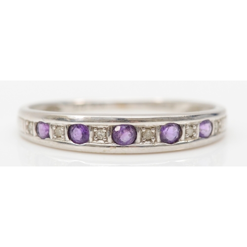 267 - A 9ct white gold amethyst and eight cut diamond dress ring, Q-R, 1.3gm.