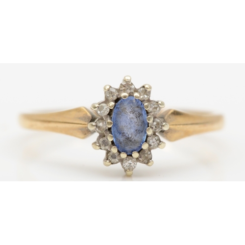 268 - A 9ct gold sapphire and eight cut diamond cluster ring, M-N, 1.7gm.