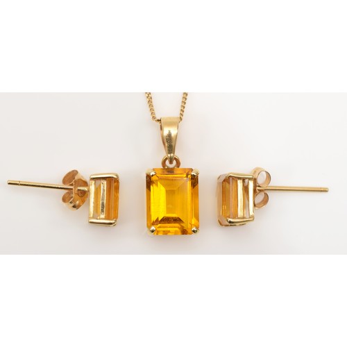 270 - A 14k gold emerald cut citrine pendant, on 375 gold chain, 16mm, together with a matching pair of un... 